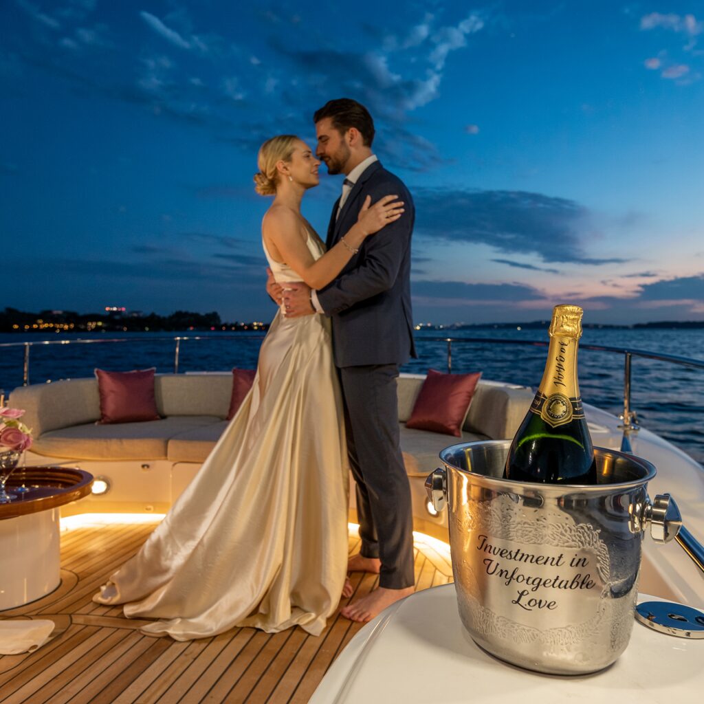 couple on a boat dancing in sunset